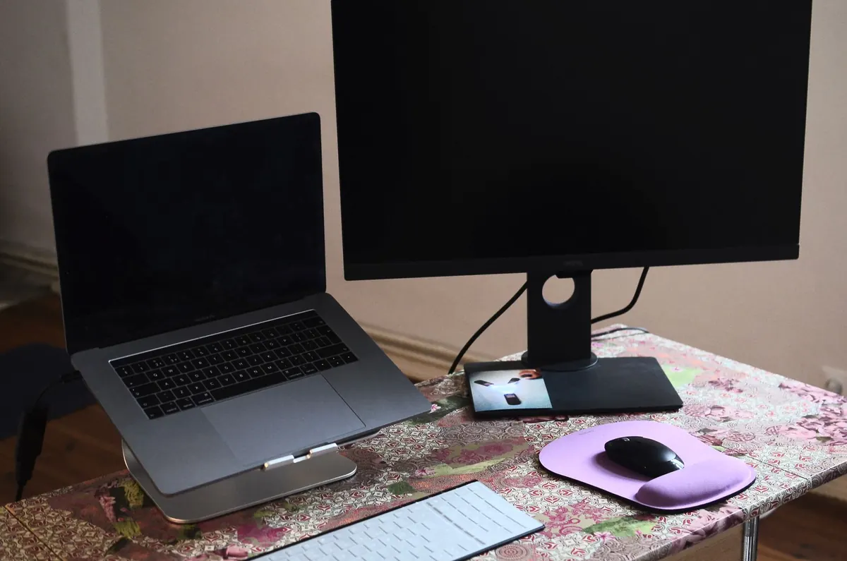 Laptop Stand vs. Monitor Arm: Which Is Better for a Home Office?